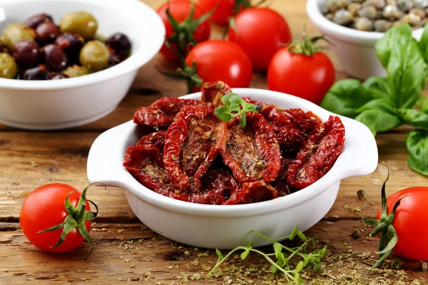 Mediterranean Food Tapas Dried Tomatoes Olives Anchovies Rustic Background — Stock Photo, Image