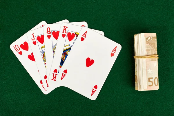 Poker cards on green table. — Stock Photo, Image