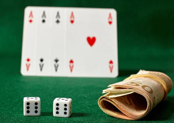 White dices,a roll of money and four aces — Stock Photo, Image