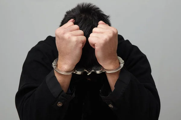 Handcuffed young man. — Stock Photo, Image