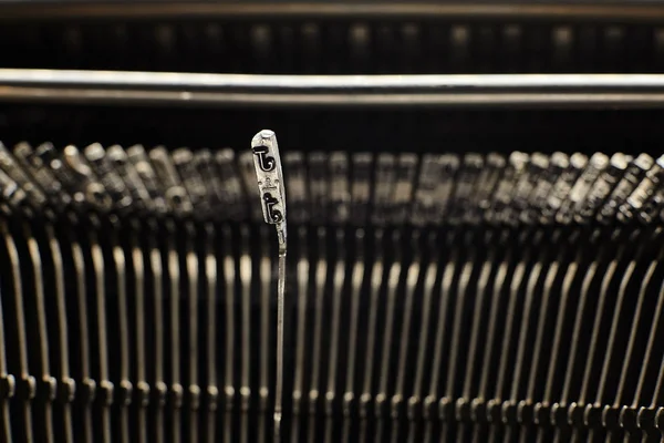 Old typewriter plates strikers with letters and symbols. — Stock Photo, Image