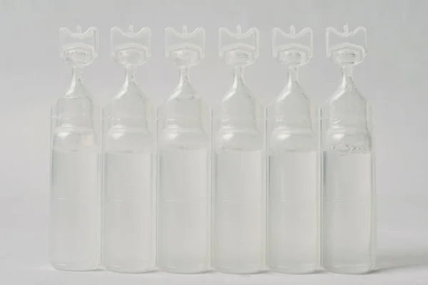 Plastic bottle of serum saline. — Stock Photo, Image