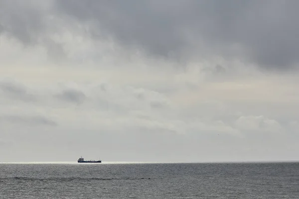 Ship in the sea on a cloudy day. — Stock Photo, Image