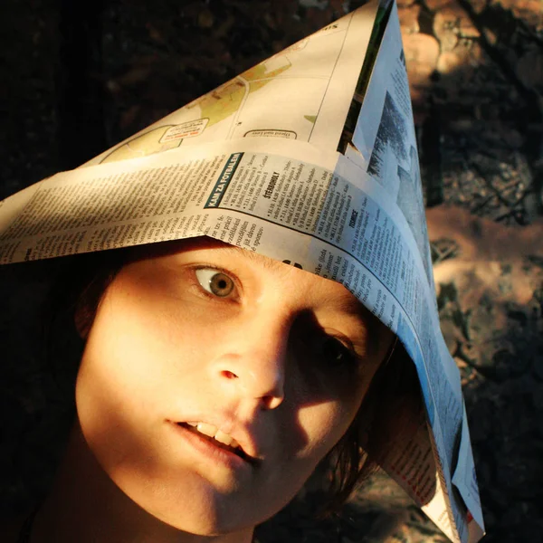 Freaky carnival girl with paper hat — Stock Photo, Image