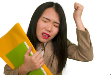 corporate business stress portrait of young attractive upset and stressed executive Asian Korean woman tired and unhappy holding paperwork overwhelmed