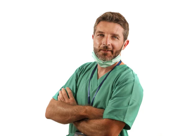 hospital clinic staff corporate portrait of attractive and successful medicine doctor smiling confident in green medical clothes and protective face mask in health care concept