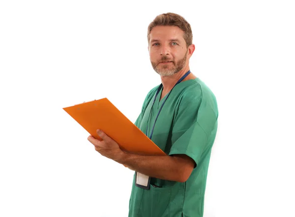 Isolated portrait of young attractive and happy medicine doctor or nurse man holding clipboard medical paperwork on white background in health care hospital attendant concept — 스톡 사진