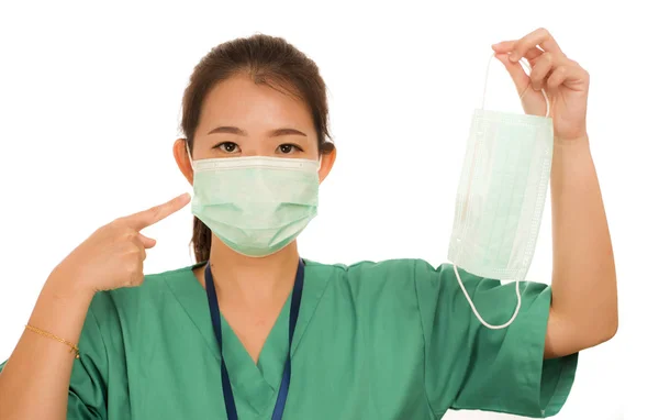 Coronavirus outbreak in China - young beautiful Asian Korean medicine doctor woman or hospital nurse recommend use of protective face mask in prevention vs virus infection — 스톡 사진