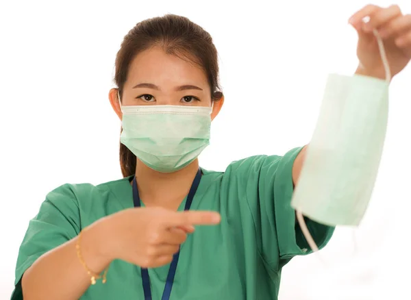 Coronavirus outbreak in China - young beautiful Asian Korean medicine doctor woman or hospital nurse recommend use of protective face mask in prevention vs virus infection — 스톡 사진