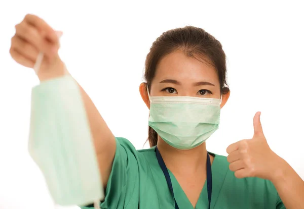 Coronavirus outbreak in China - young beautiful Asian Korean medicine doctor woman or hospital nurse recommend use of protective face mask in prevention vs virus infection — 스톡 사진