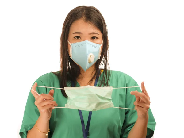 Young beautiful Asian Korean medicine doctor woman or hospital nurse recommend use of protective face mask in prevention vs virus infection in health care — 스톡 사진