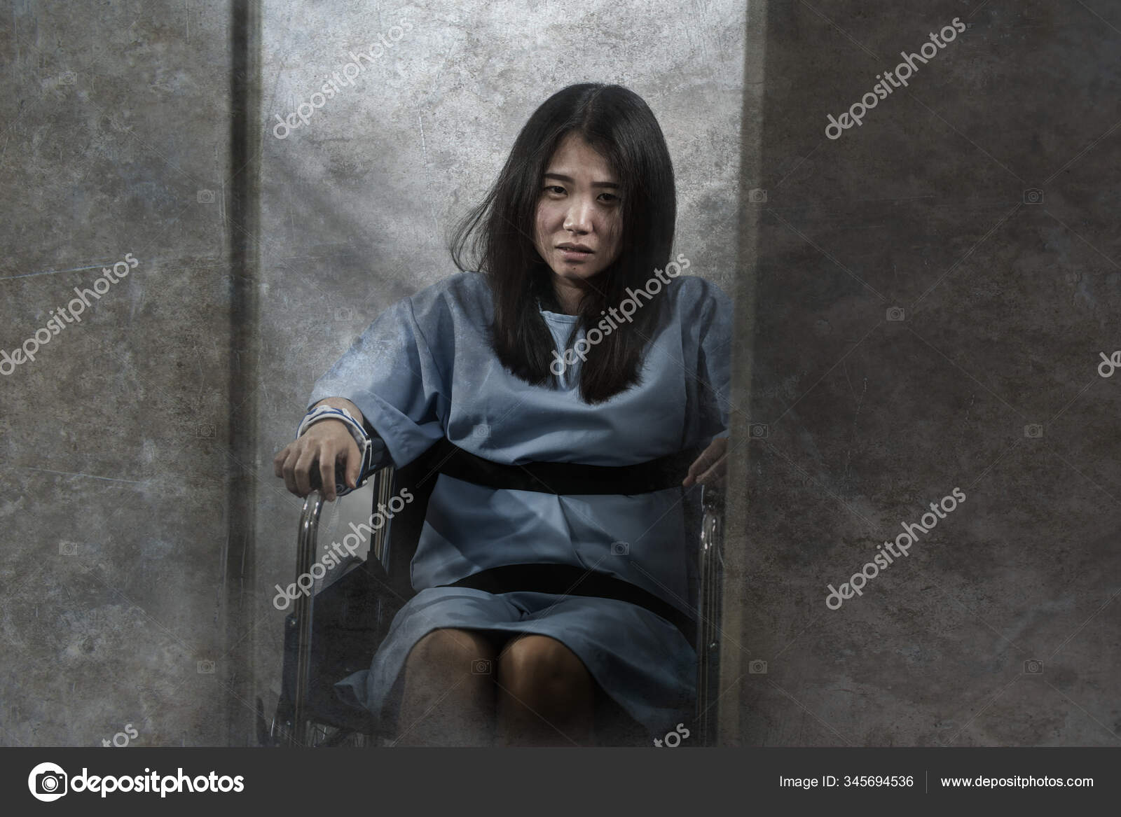 Young crazy and mentally insane Asian woman restrained in wheelchair at  mental hospital suffering psychiatric disorder as schizophrenia looking  catatonic Stock Photo by ©TheVisualsYouNeed 345694536