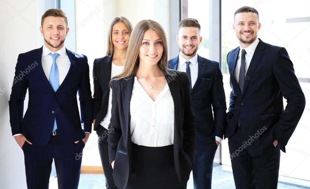 Face of beautiful woman on the background of business people