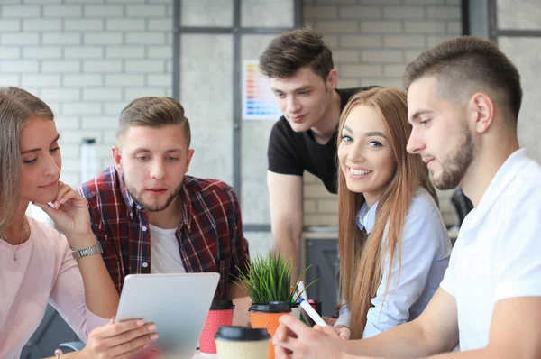 Group of young business people and designers — Stock Photo, Image