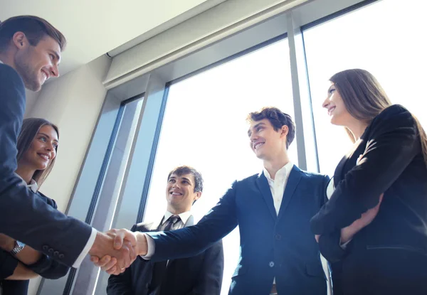 Business people shaking hands, finishing up a meeting. — Stock Photo, Image