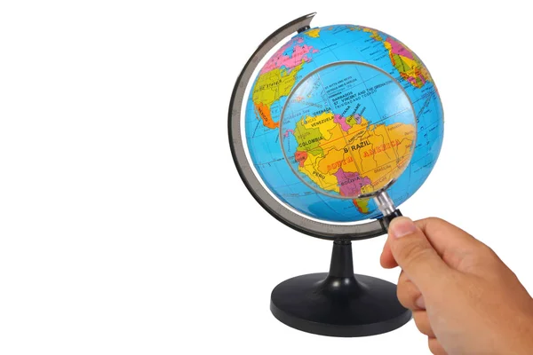 Magnifying Glass on Earth Globe on White — Stock Photo, Image