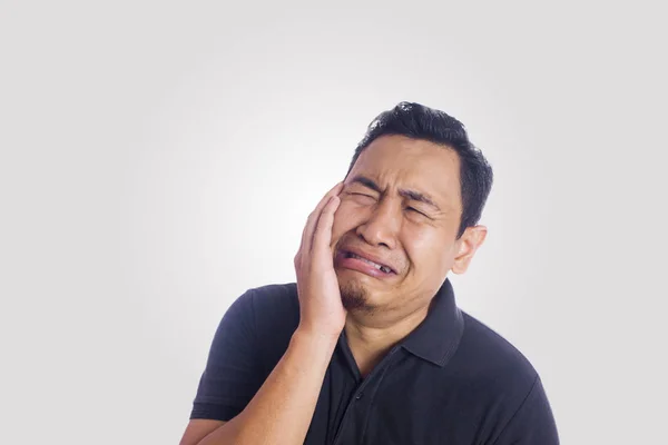 Drôle asiatique l'homme Gros plan mal de dents douleur visage — Photo