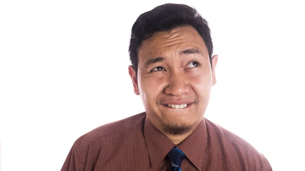 Vicces ázsiai ember közelről, mosolygó arc gondolkodás — Stock Fotó