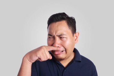 Asya adam onun burun hasta kötü koku kapatın