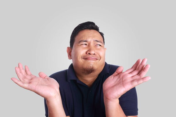 Asian Man Shrug Gesture