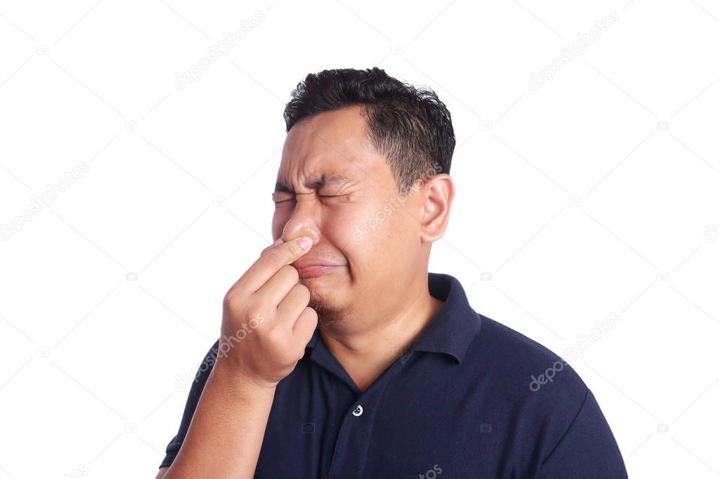 Asian Man Close His Nose Sick of Bad Smell