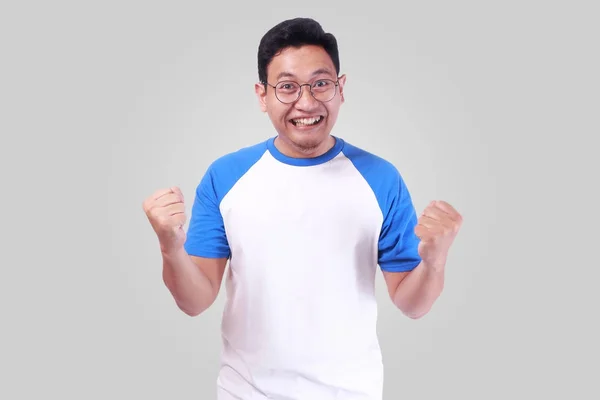 Young Man Excited of Success Victory Gesturing Fists Up — Stock Photo, Image