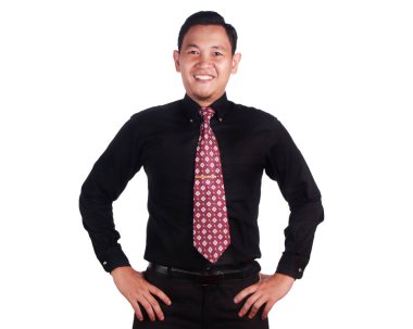 Gülümseyen, kalça ellerde başarılı iş adamı 