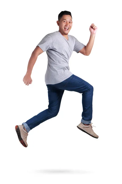 Lebegés. Fiatal ázsiai férfi, ugrálás, tánc, gyaloglás — Stock Fotó