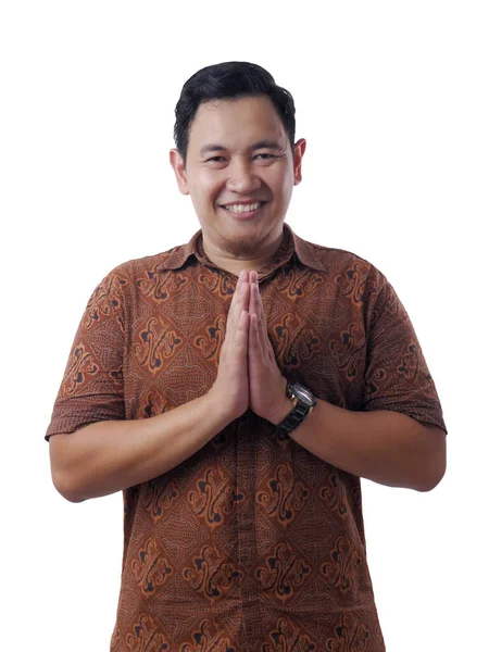 Young Asian Man Smiling and Shows Asian Greeting Gesture — Stock Photo, Image