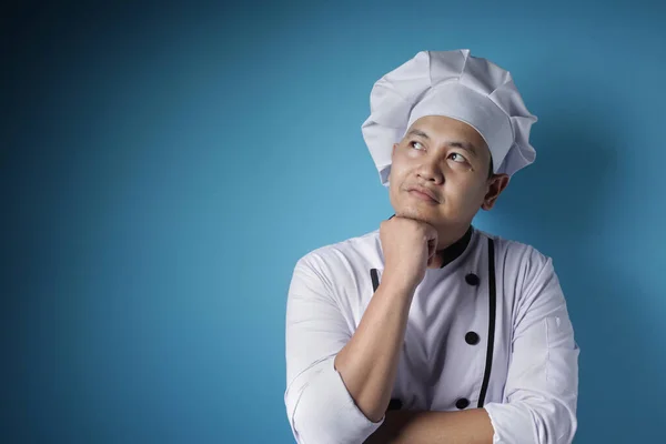 Man aziatische chef denken iets — Stockfoto