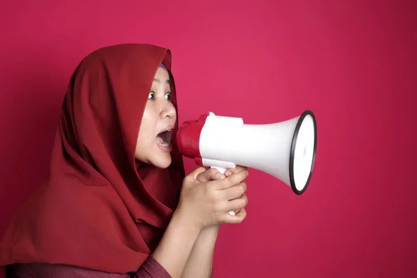 Asian woman Shouting with Megaphone, Side View
