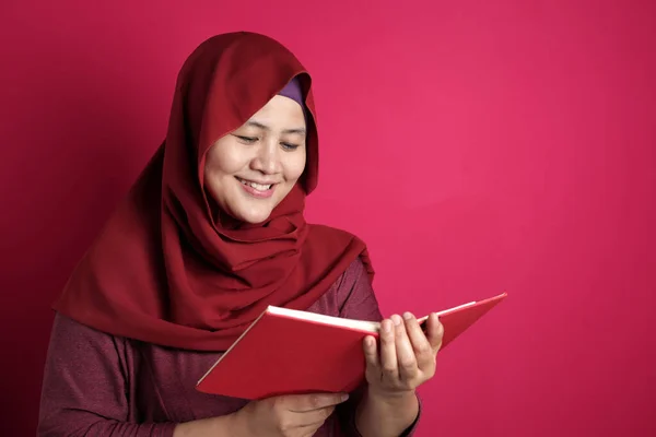 Muslim Businesswoman Reading Book