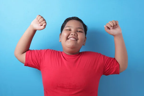 Strong healthy fat Asian boy shows his muscle — ストック写真