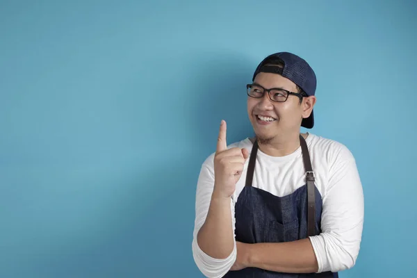 Happy Asian Chef or Waiter Smiling With Pointing Finger Up, Havi