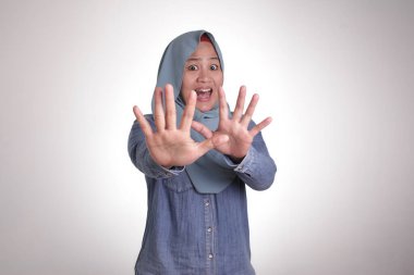 Shocked Worried Asian Muslim Woman With Mouth Opened 