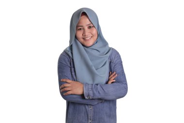 Confident Muslim Lady Smiling Friendly with Crossed Arms
