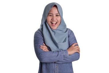 Confident Muslim Lady Smiling Friendly with Crossed Arms