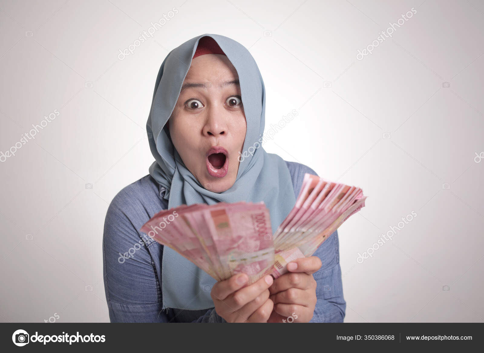 Portrait Indonesian Muslim Woman Holding Rupiah Money Smiling Laughing