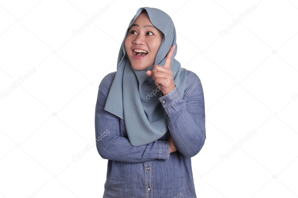 Asian muslim businesswomen wearing hijab with curiousity thinking expression. Having good idea, isolated on white