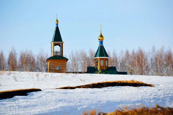 Rustic church decorates landscape — Stock Photo, Image