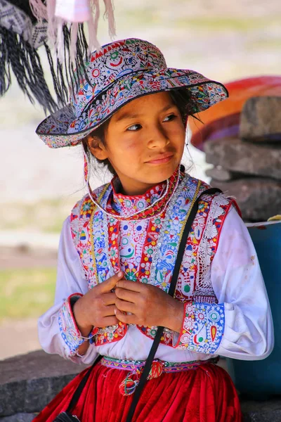 stock image MACA, PERU-JANUARY 16: Unidentified girl in traditional dress si