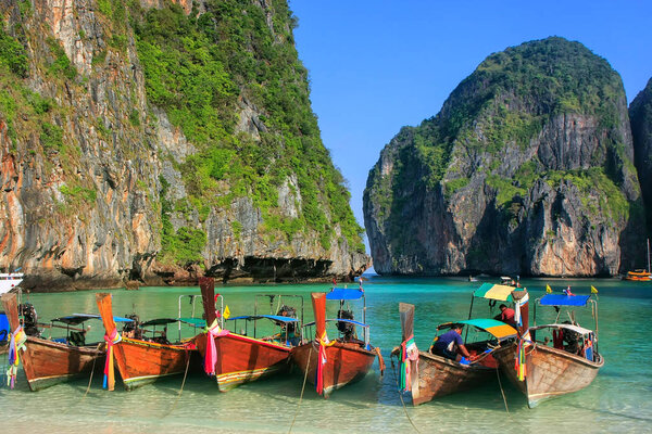 Longtail boats anchored at Maya Bay on Phi Phi Leh Island, Krabi