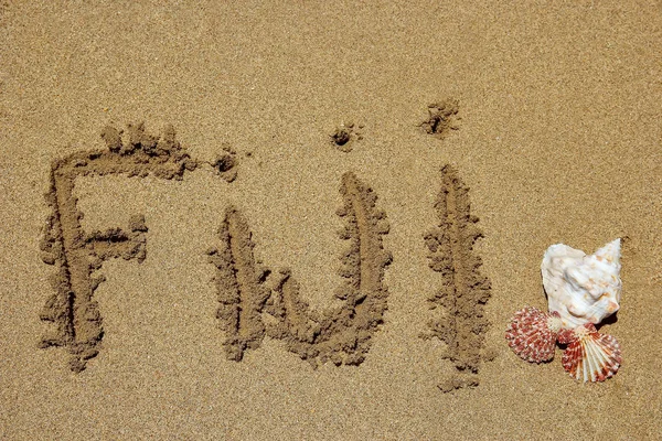 Mot Fidji écrit sur une plage — Photo