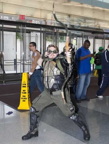Man wearing Green Arrow costume at NY Comic Con — Stock Photo, Image