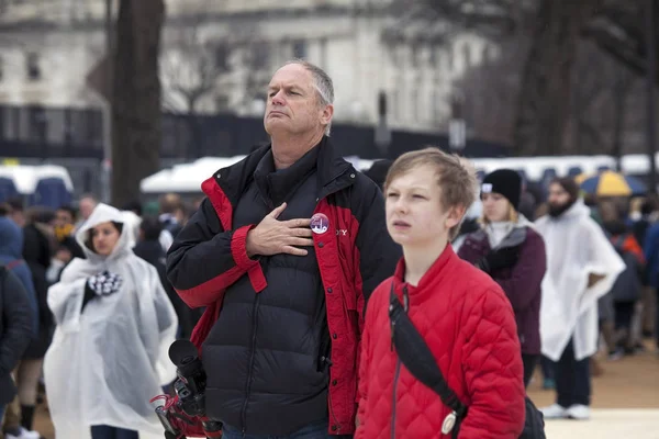 Man with hand to heart  during American anthem at Inauguration o — Stock Photo, Image