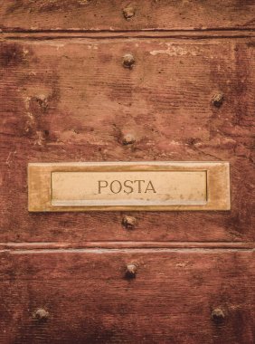 post signboard on doors in Orvieto, Rome suburb, Italy  clipart