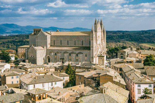 aerial view of old Orvieto Cathedral and buildings in Orvieto, Rome suburb, Italy 