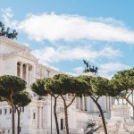 Beautiful Altare della Patria (Altar of the Fatherland) with trees on foreground, Rome, Italy