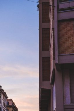 building wall and clear sky in Rome, Italy clipart