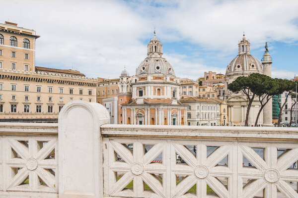 ROME, ITALY - 10 MARCH 2018: beautiful domes of Santa Maria di Loreto church seen from Altare della Patria (Altar of the Fatherland) at Rome